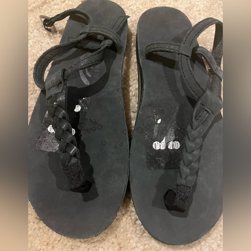 Woman’s rainbow sandals